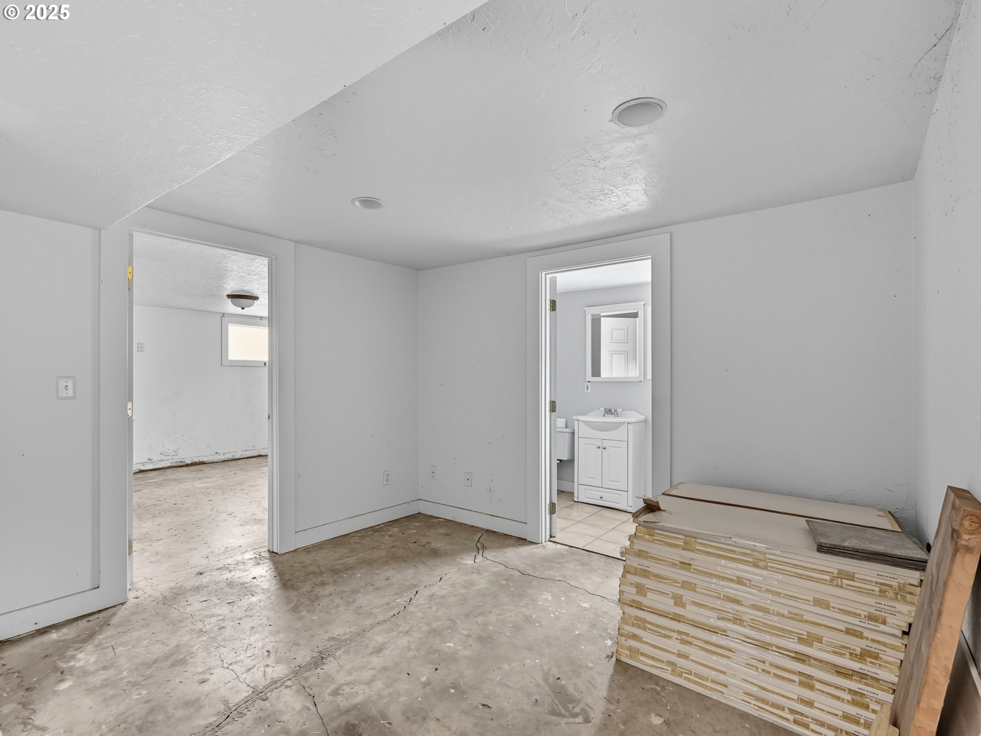 686 29th Street Astoria, OR 97103 - Photo 35 of 48 a view of a room with wooden floor and bathroom