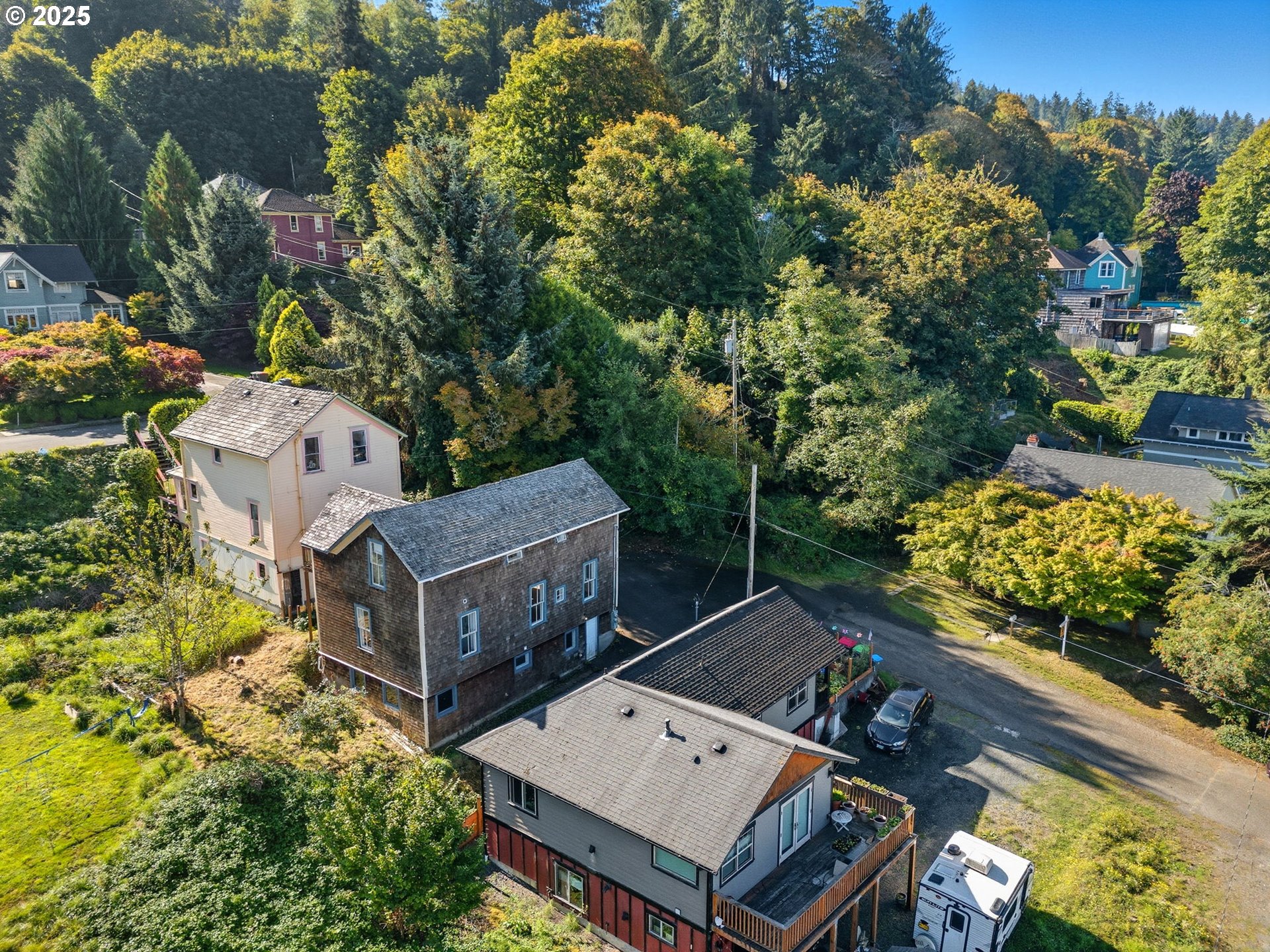 686 29th Street Astoria, OR 97103 - Photo 43 of 48 aerial view of a house with wooden fence