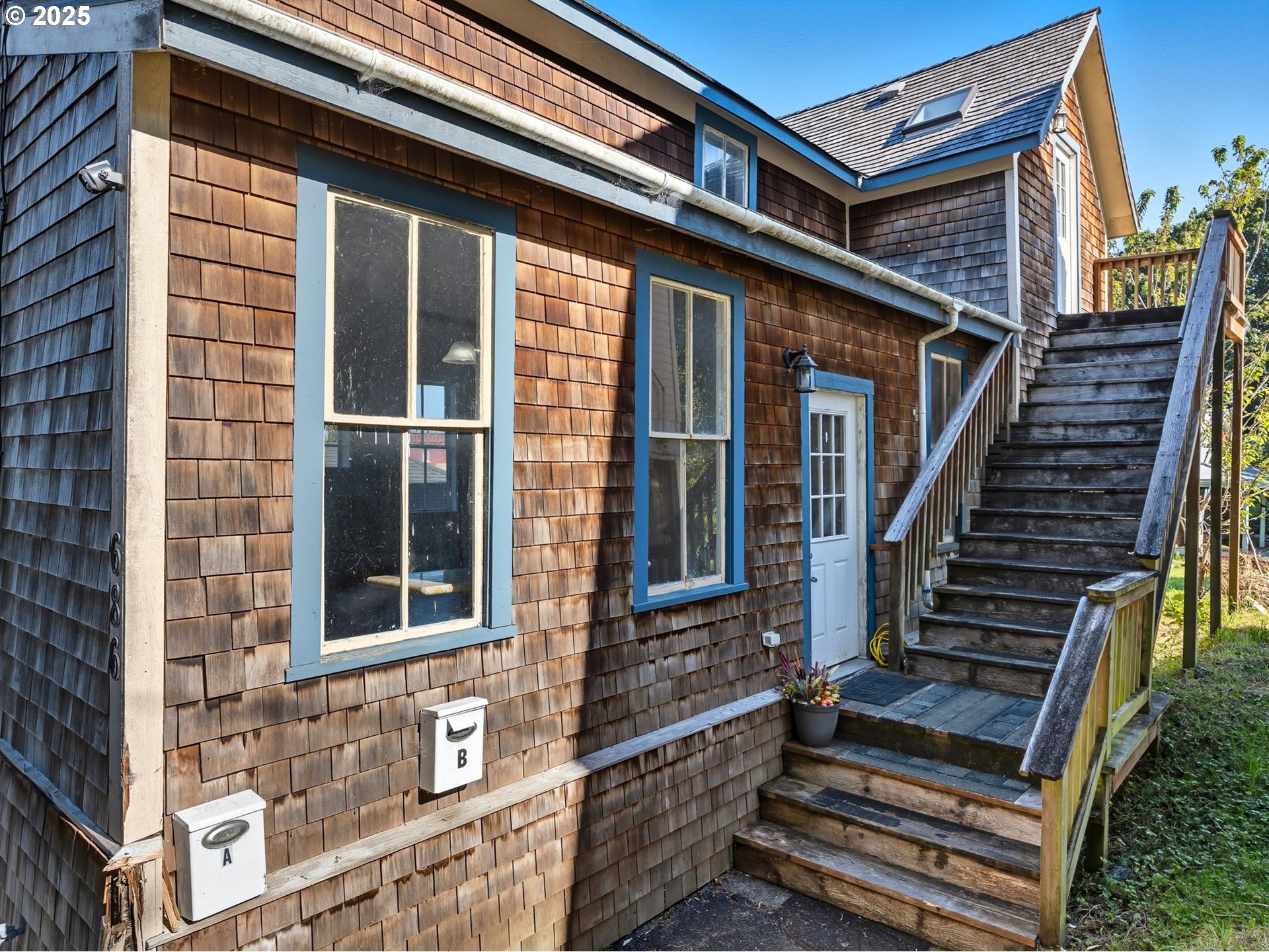 686 29th Street Astoria, OR 97103 - Photo 5 of 48 front view of a house with a window