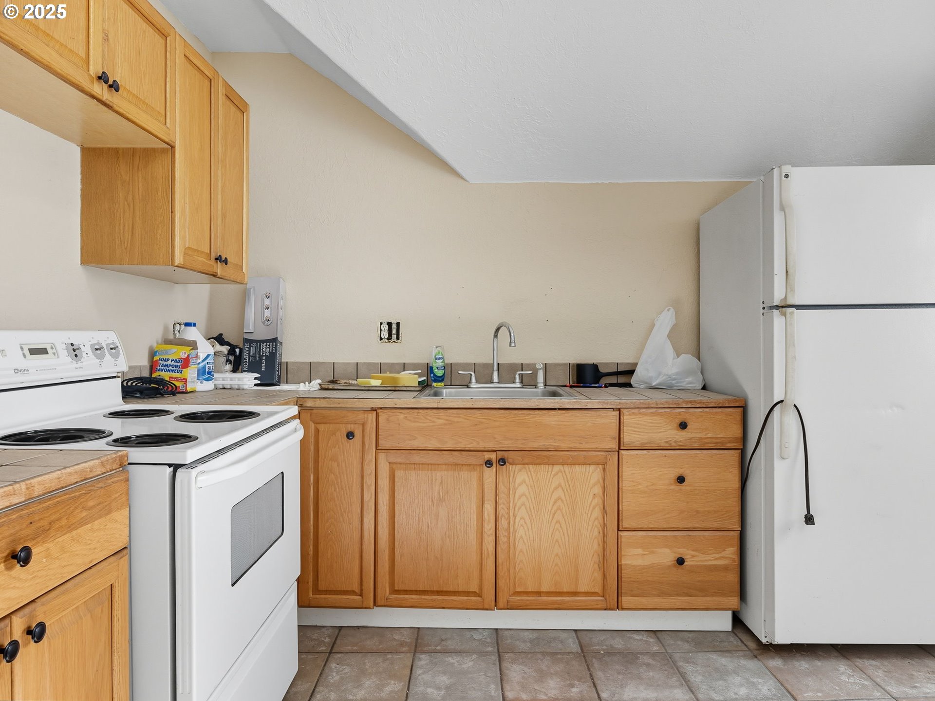 686 29th Street Astoria, OR 97103 - Photo 9 of 48 a kitchen with cabinets appliances and a sink