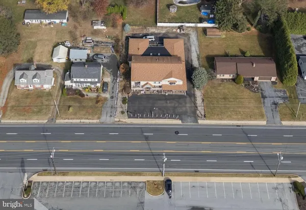 a view of a bathroom with bathtub
