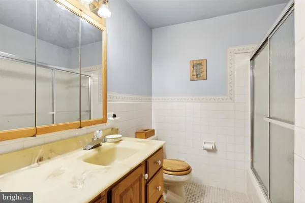 a kitchen with stainless steel appliances granite countertop a stove sink microwave and cabinets