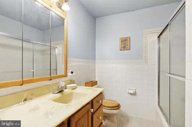 a kitchen with stainless steel appliances granite countertop a stove sink microwave and cabinets