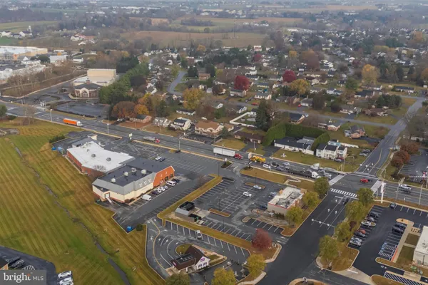 an aerial view of a house with a lake view