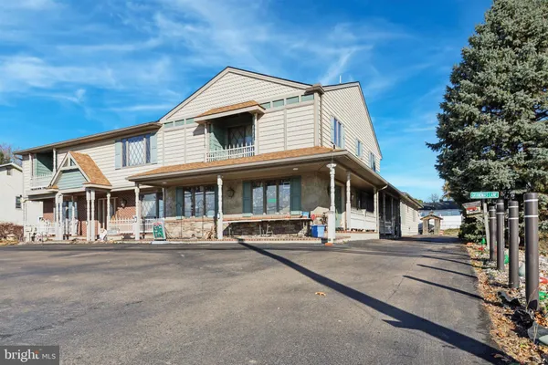 a front view of a building with street