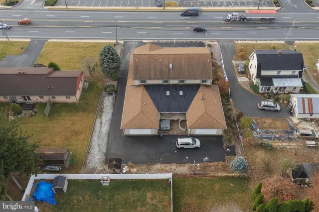 front view of a house with a street