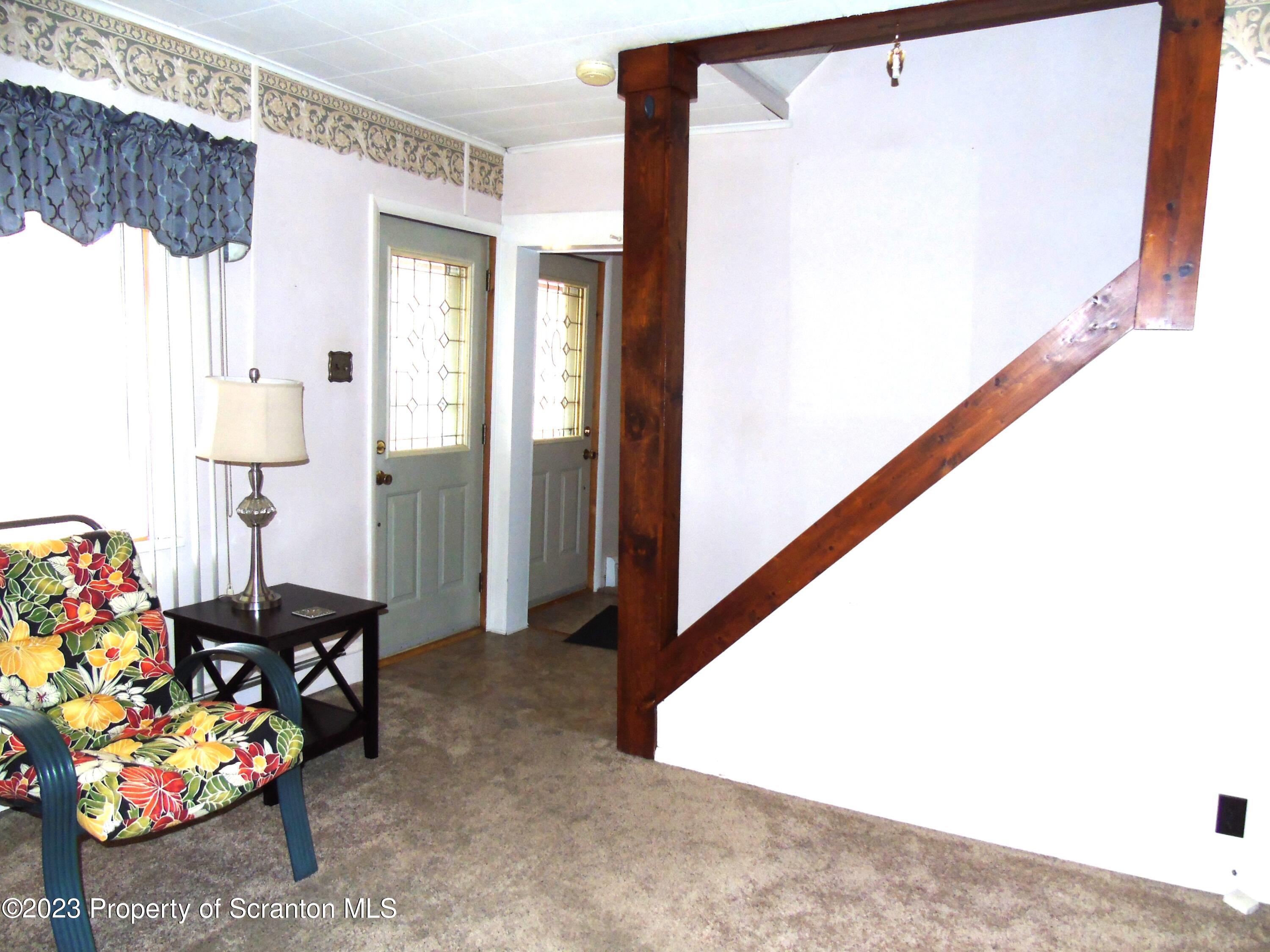 115 T Rte 718 Moscow, PA 18444 - Photo 26 of 26 a hallway with toys and stairs