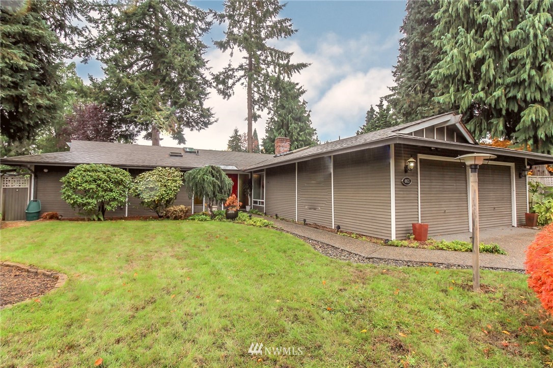 4615 Northeast 24th Street Renton, WA 98059 - Photo 1 of 40 front view of a house with a yard