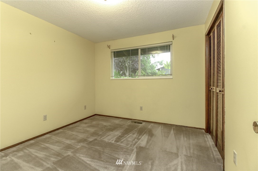 4615 Northeast 24th Street Renton, WA 98059 - Photo 24 of 40 an empty room with a window