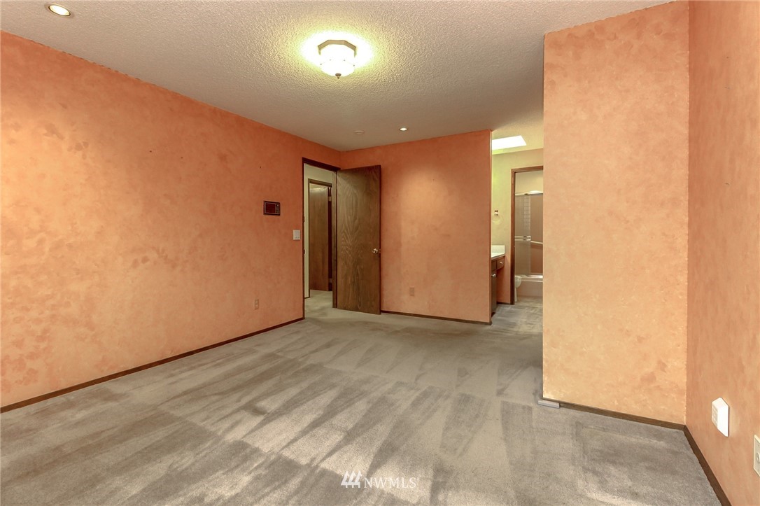 4615 Northeast 24th Street Renton, WA 98059 - Photo 28 of 40 an empty room with a natural light