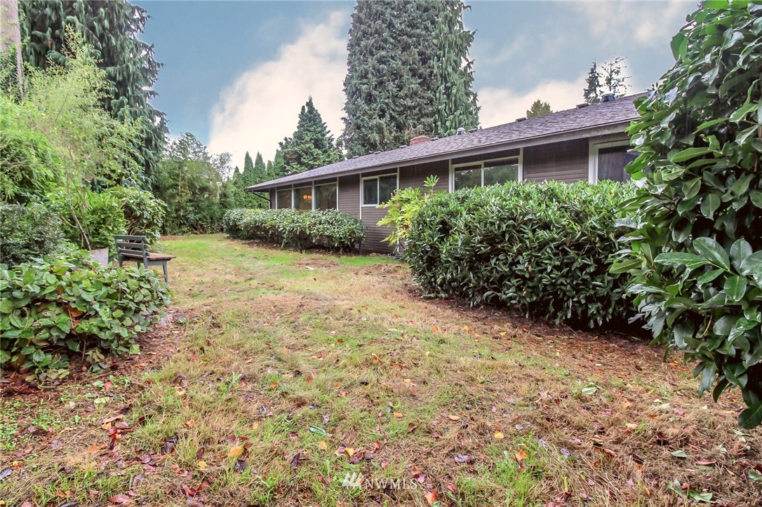 4615 Northeast 24th Street Renton, WA 98059 - Photo 38 of 40 a view of a house with a yard