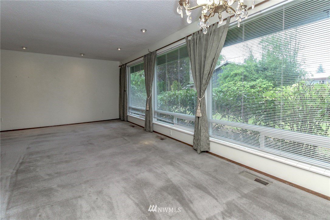 4615 Northeast 24th Street Renton, WA 98059 - Photo 9 of 40 a view of an empty room with a balcony