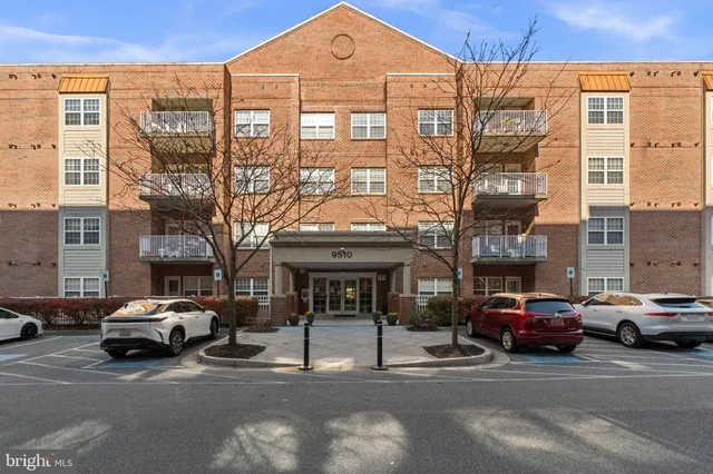 a view of a car parked in front of a building