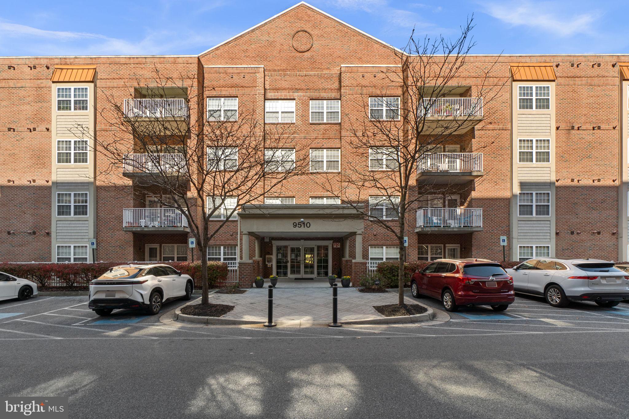 9510 Coyle Road, Unit 109 Owings Mills, MD 21117 - Photo 2 of 41 a view of a car parked in front of a building