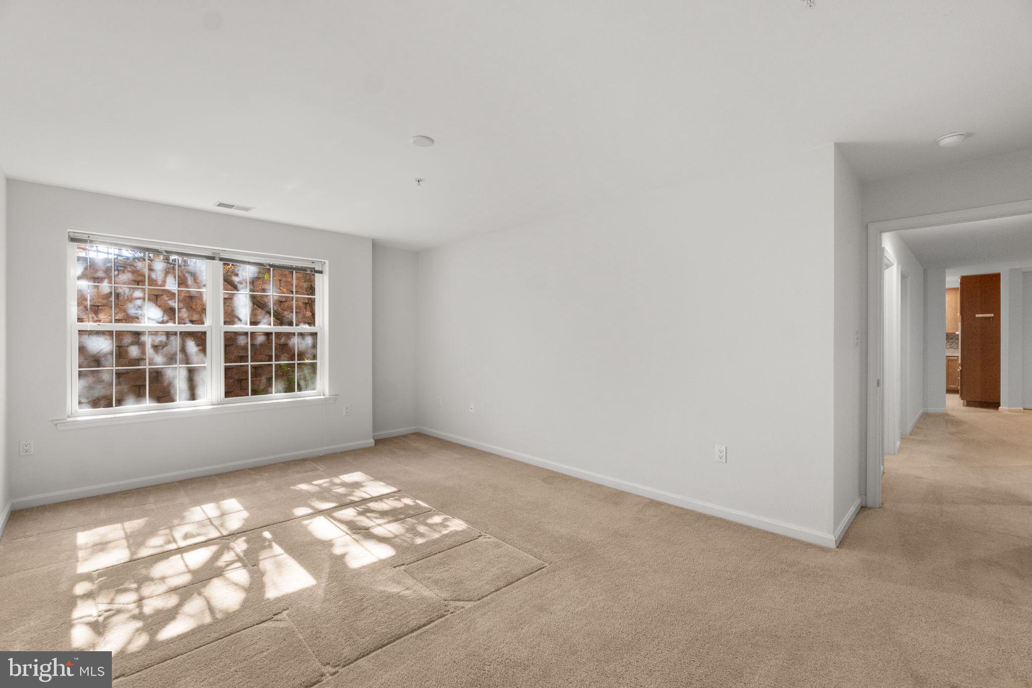 9510 Coyle Road, Unit 109 Owings Mills, MD 21117 - Photo 22 of 41 a view of empty room with window