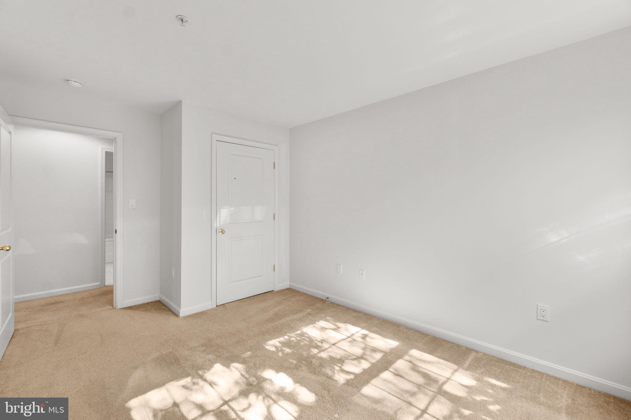 9510 Coyle Road, Unit 109 Owings Mills, MD 21117 - Photo 29 of 41 a view of a big room with closet and bed