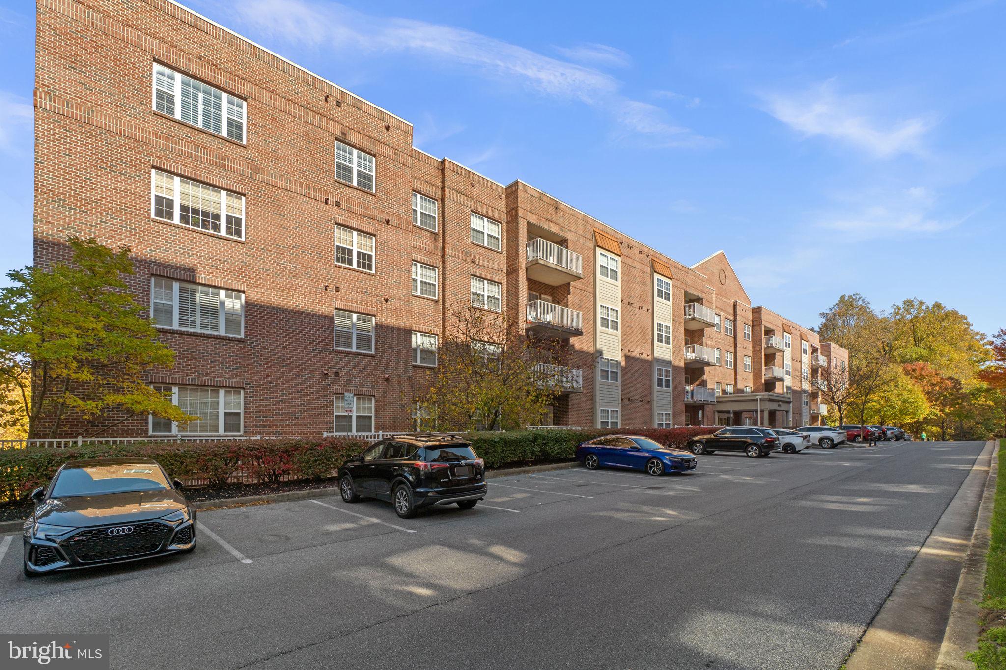 9510 Coyle Road, Unit 109 Owings Mills, MD 21117 - Photo 40 of 41 a car parked in front of a building