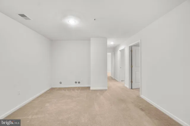 an empty room with an entryway