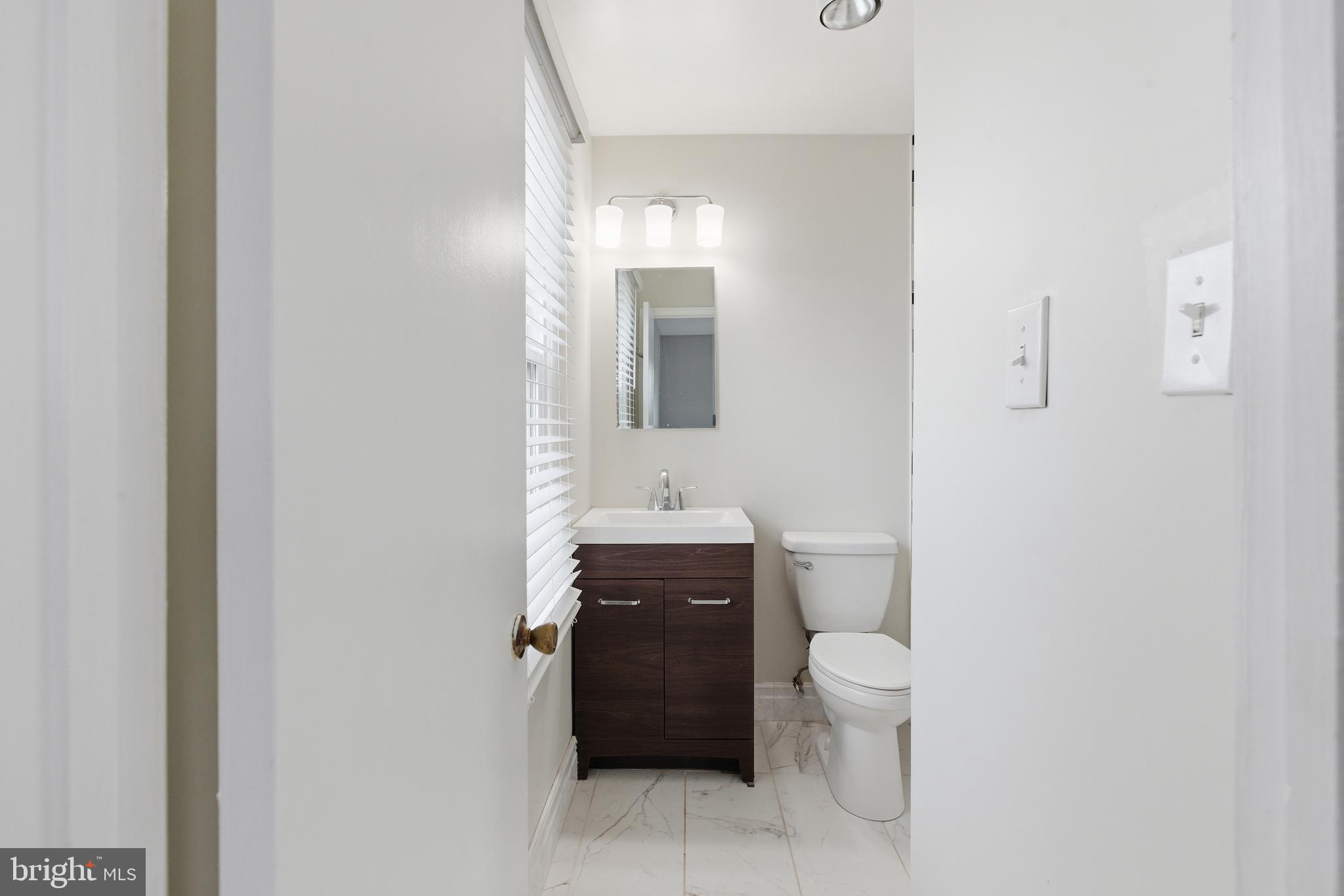 505 Montgomery Street Laurel, MD 20707 - Photo 17 of 30 a bathroom with a toilet