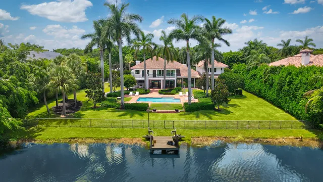 a view of a lake with a building in the background