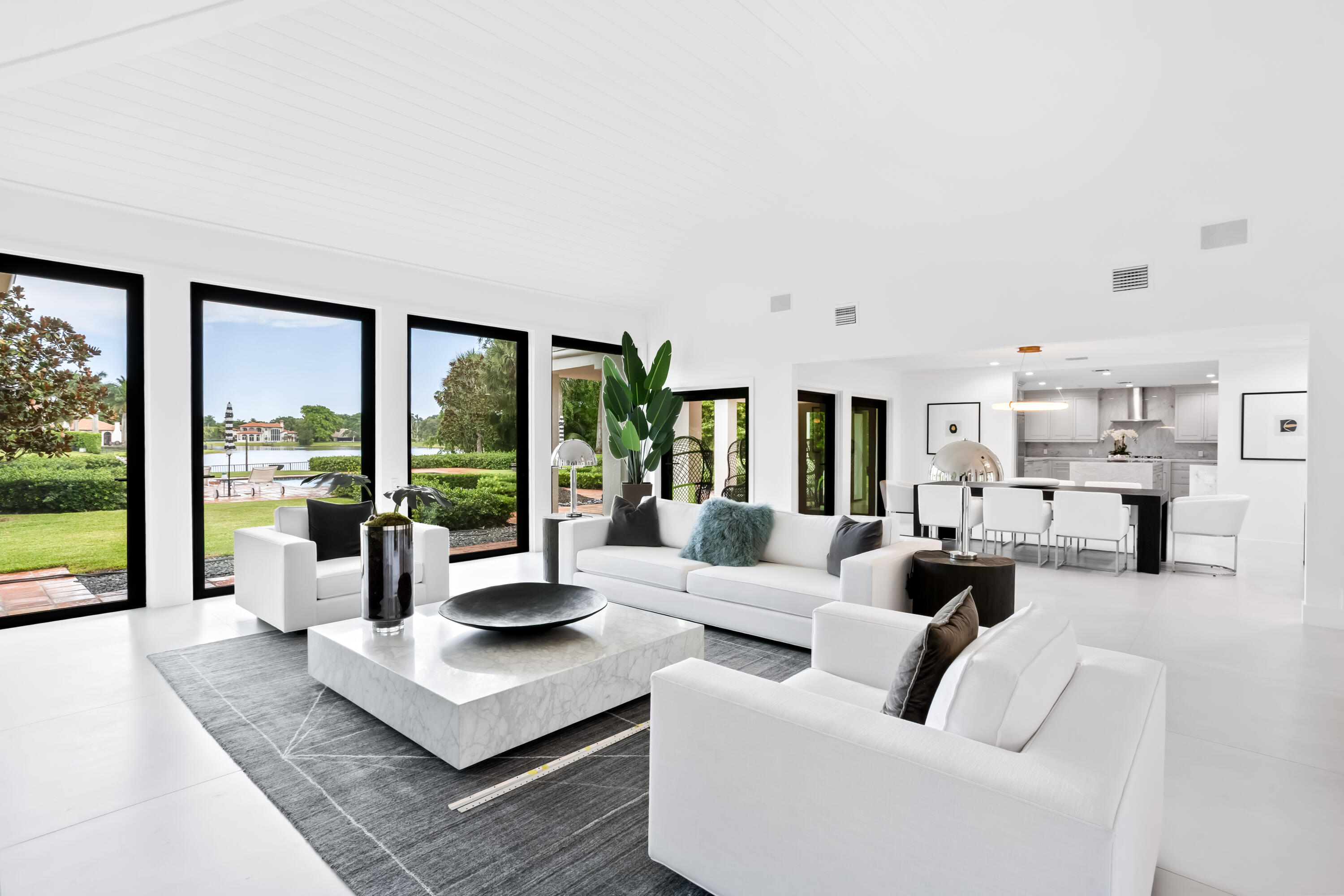 18743 Long Lake Drive Boca Raton, FL 33496 - Photo 13 of 85 a living room with furniture and large windows