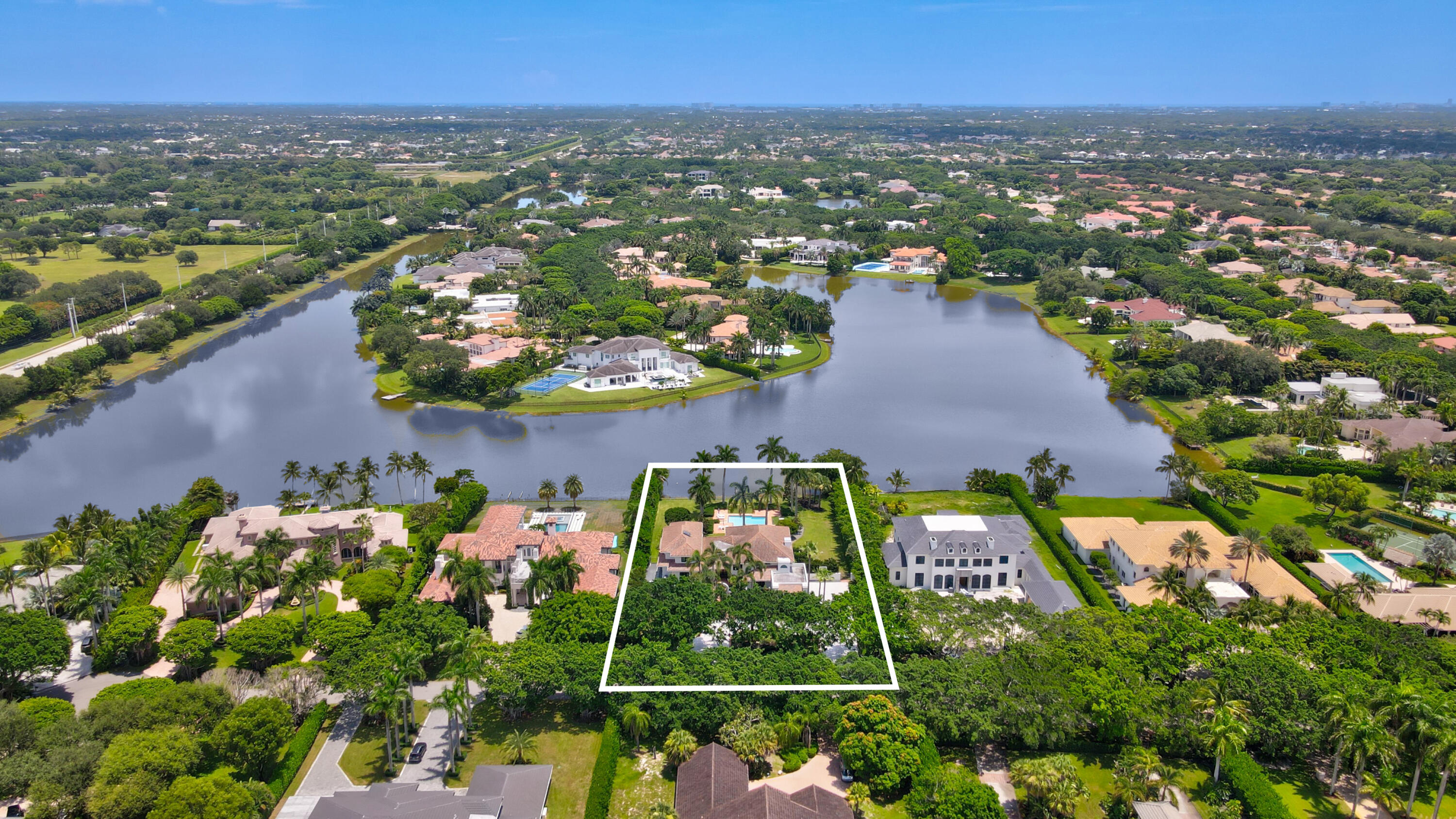 18743 Long Lake Drive Boca Raton, FL 33496 - Photo 2 of 85 an aerial view of residential houses with outdoor space and trees
