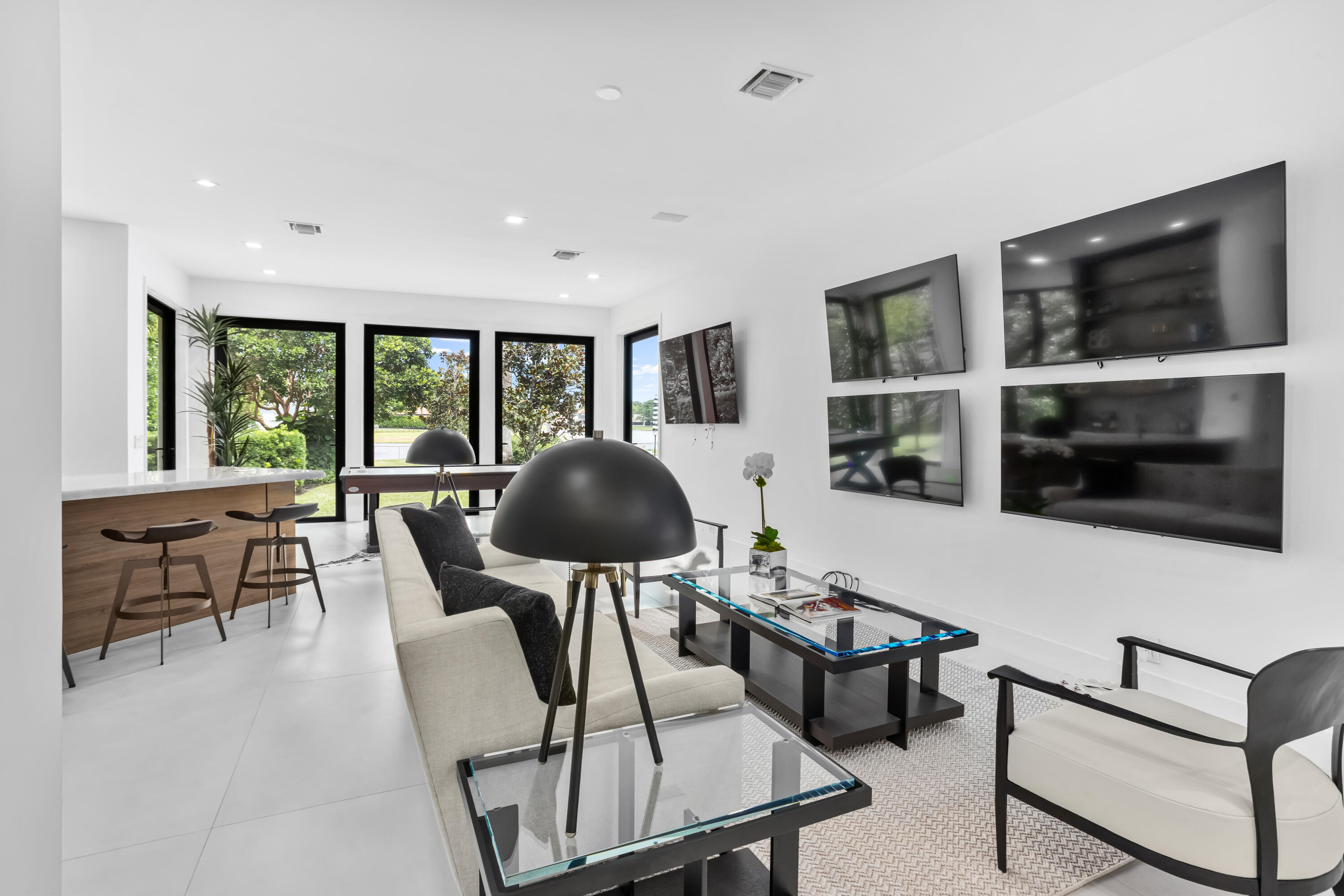 18743 Long Lake Drive Boca Raton, FL 33496 - Photo 28 of 85 a living room with furniture and a flat screen tv