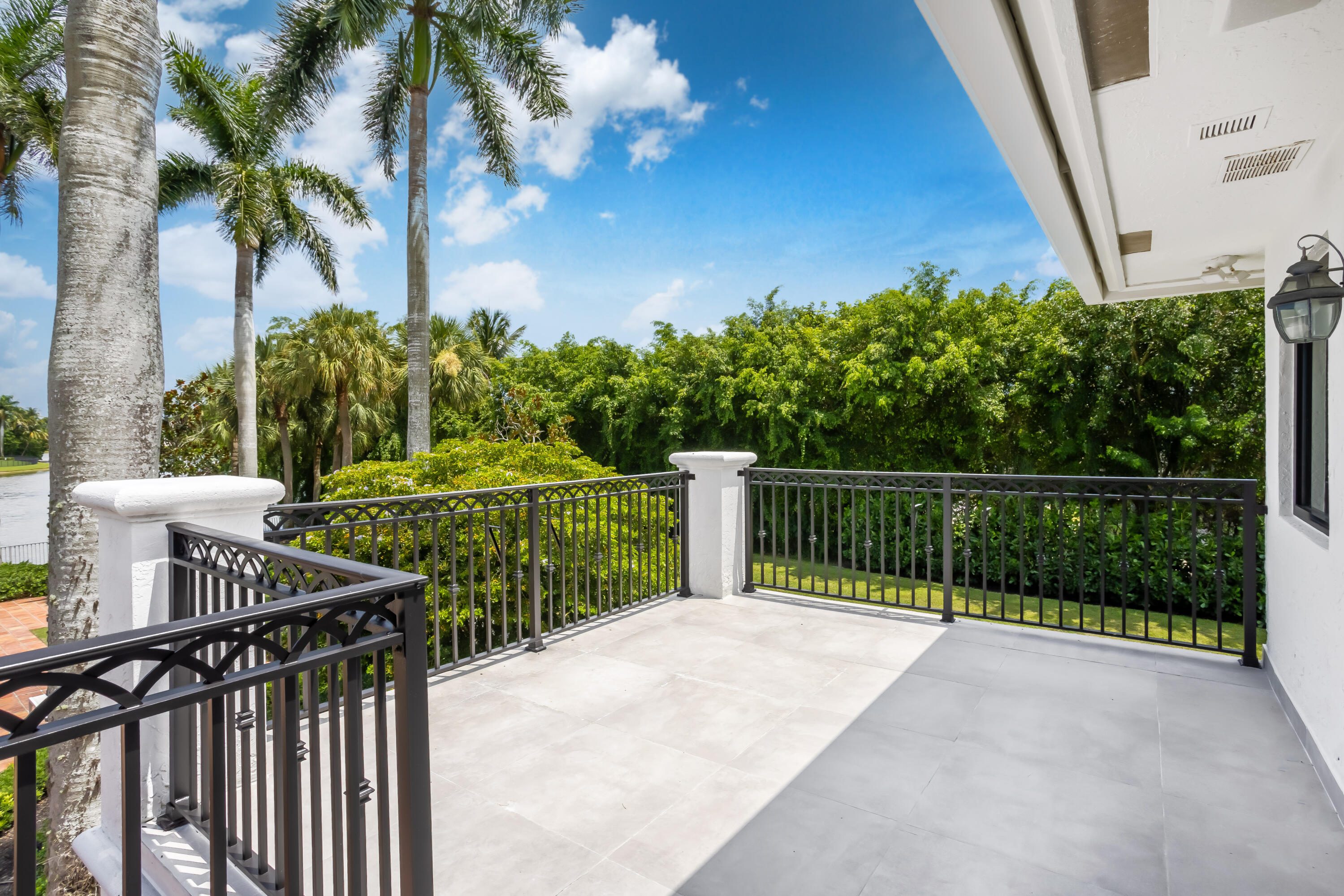 18743 Long Lake Drive Boca Raton, FL 33496 - Photo 47 of 85 a view of a balcony with wooden fence