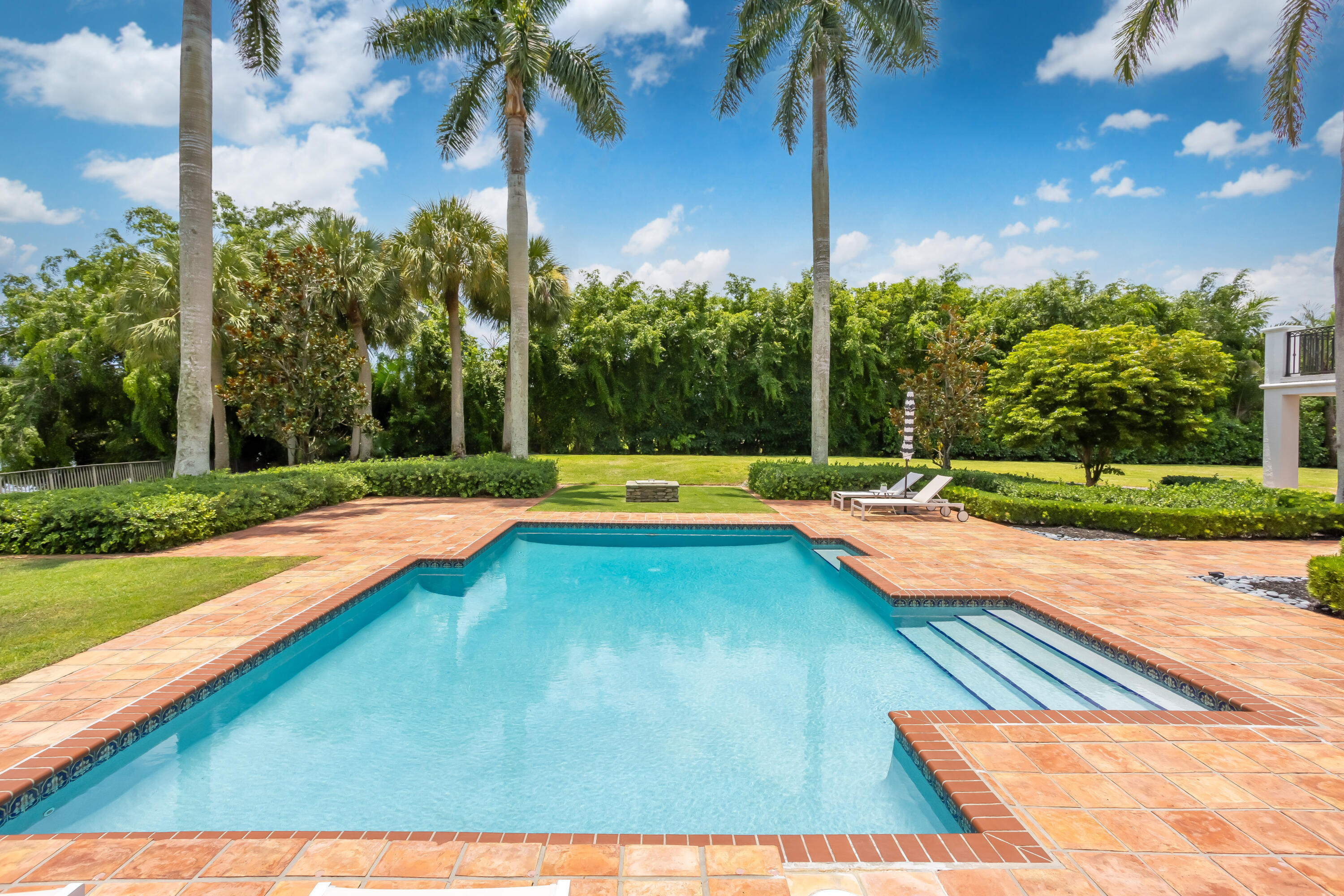 18743 Long Lake Drive Boca Raton, FL 33496 - Photo 66 of 85 a view of a swimming pool with a yard