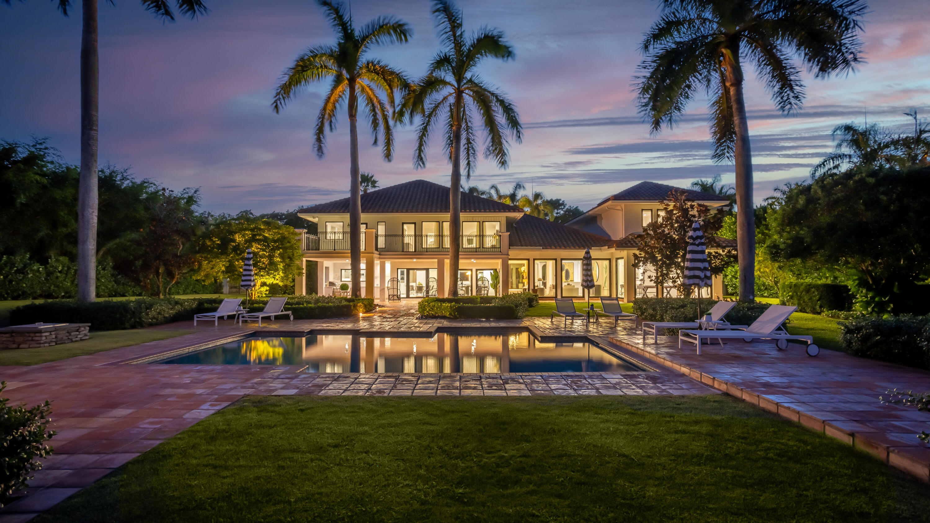 18743 Long Lake Drive Boca Raton, FL 33496 - Photo 84 of 85 a view of a swimming pool with a table and chairs