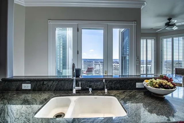 a room with furniture and a large window