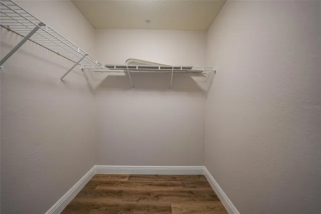 a view of a room with racks on the wall