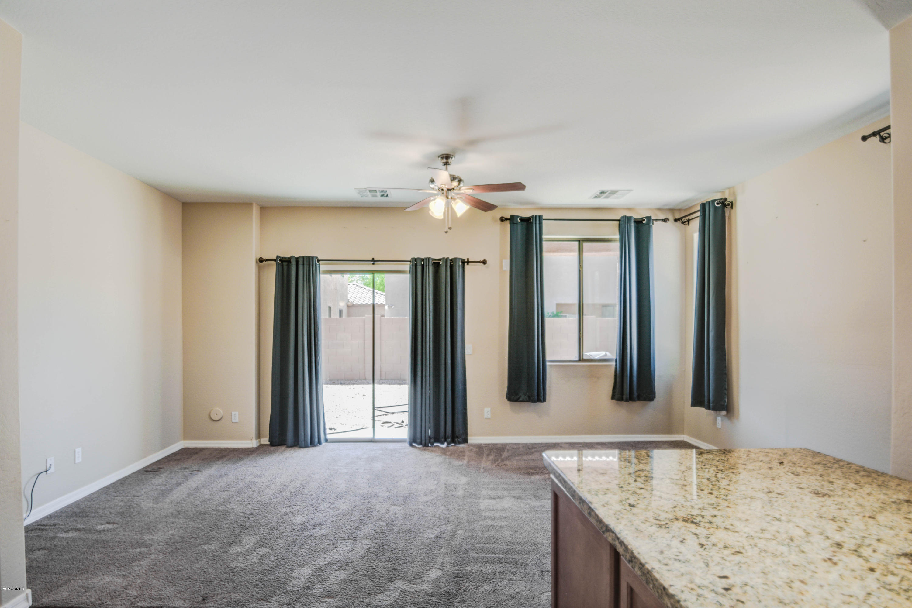 9413 West Payson Road Tolleson, AZ 85353 - Photo 12 of 39 FAMILY ROOM 1