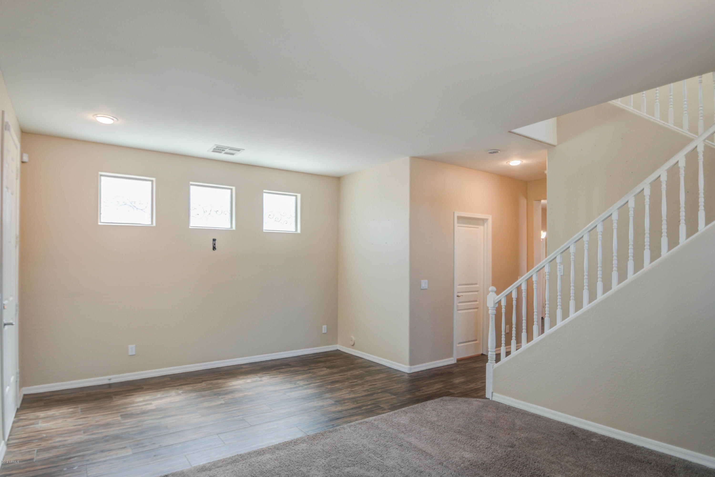9413 West Payson Road Tolleson, AZ 85353 - Photo 5 of 39 LIVING ROOM 2