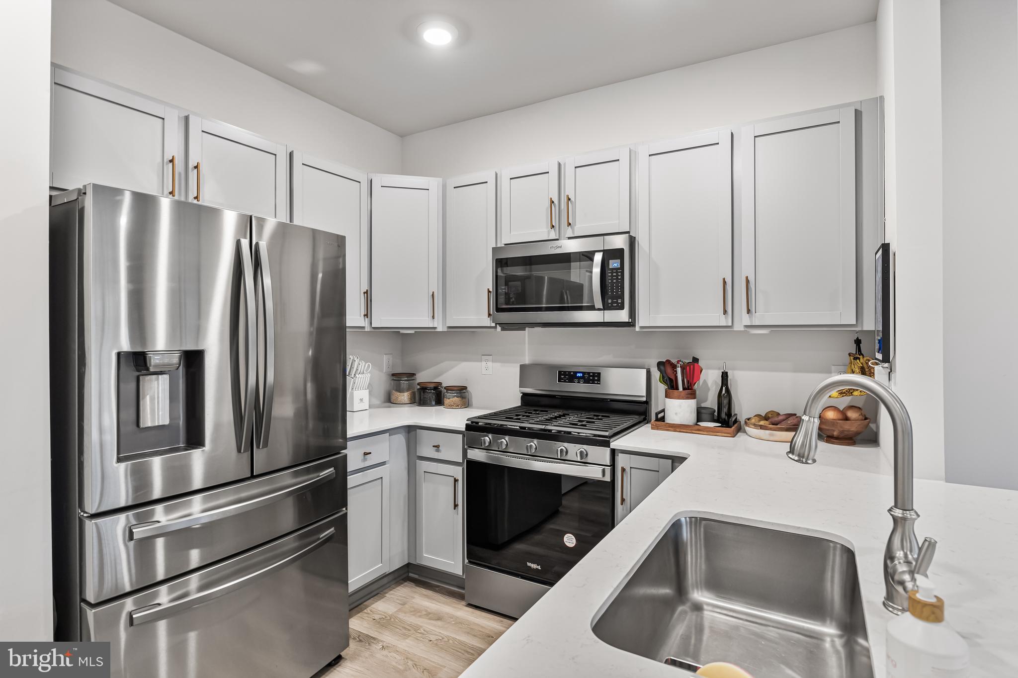 60 Nelsons Way Westampton, NJ 08060 - Photo 8 of 29 a kitchen with stainless steel appliances a refrigerator sink and microwave