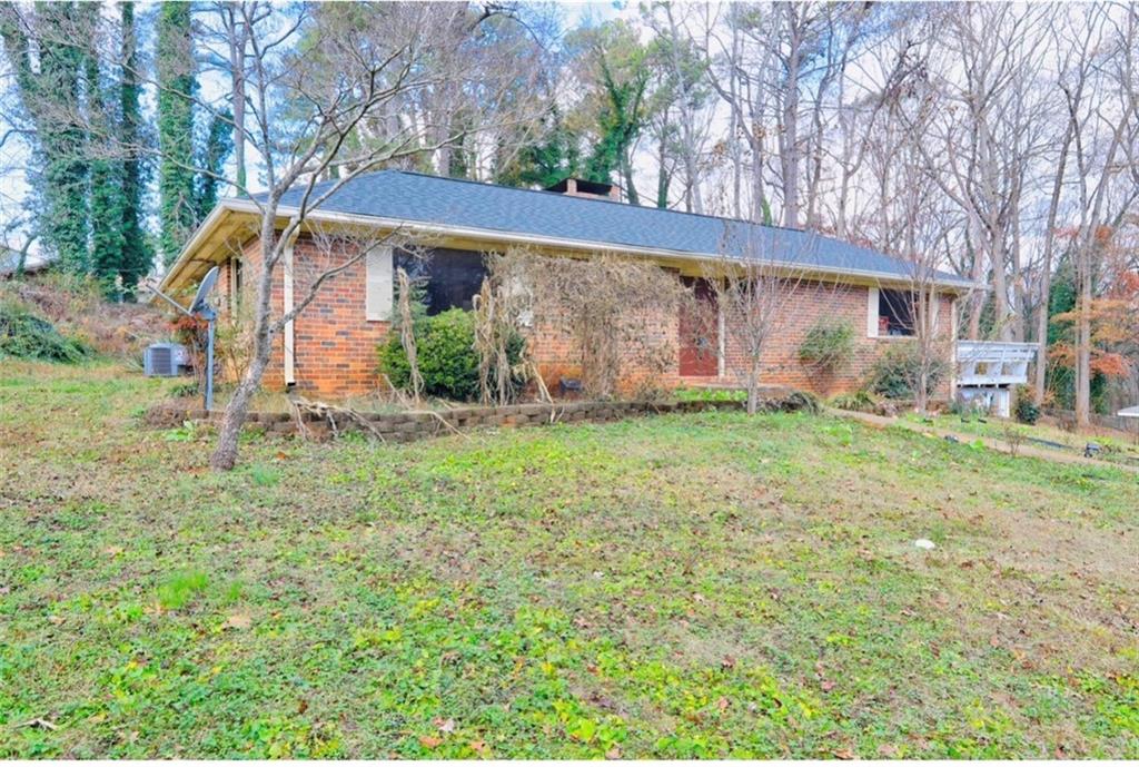 562 Dickens Road Northwest Lilburn, GA 30047 - Photo 2 of 22