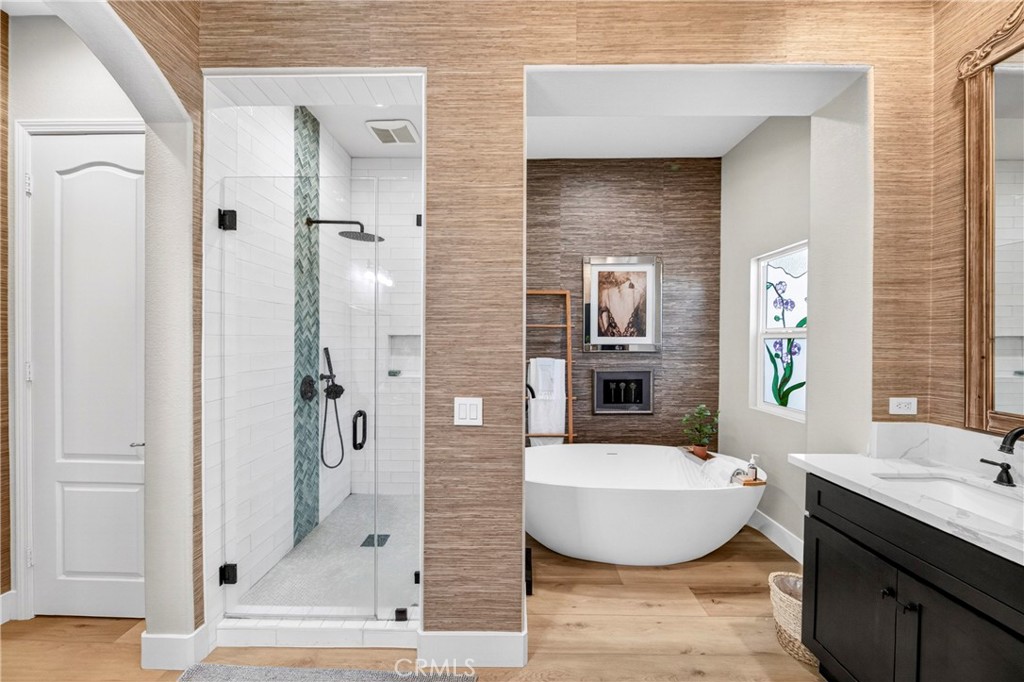 16375 Ory Circle Riverside, CA 92503 - Photo 30 of 51 a bathroom with a tub shower sink and mirror