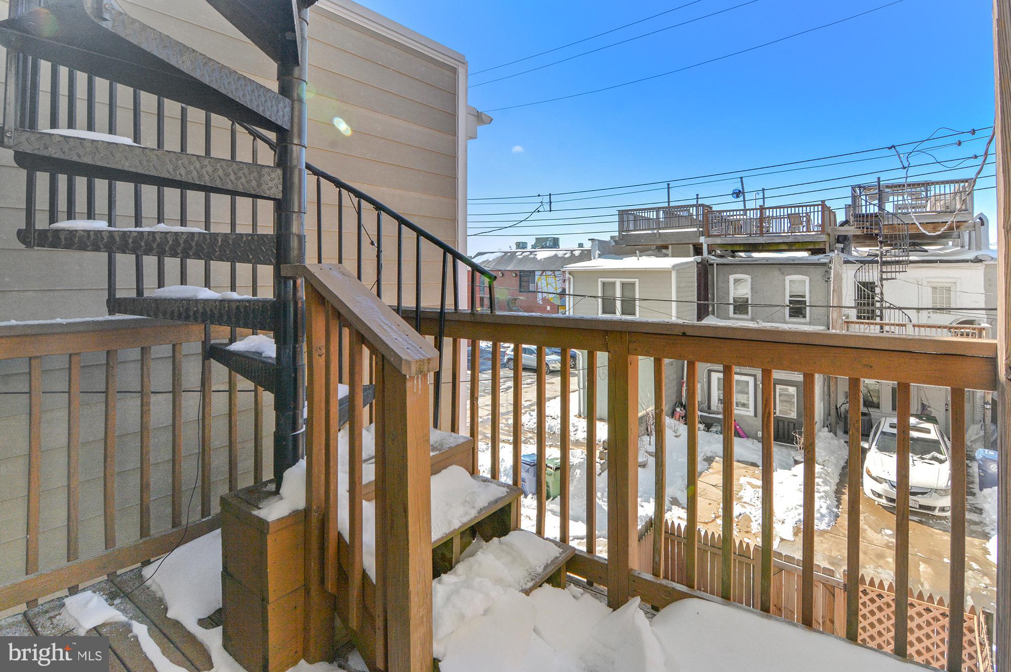 416 South Bouldin Street Baltimore, MD 21224 - Photo 35 of 45 a view of a balcony with city view