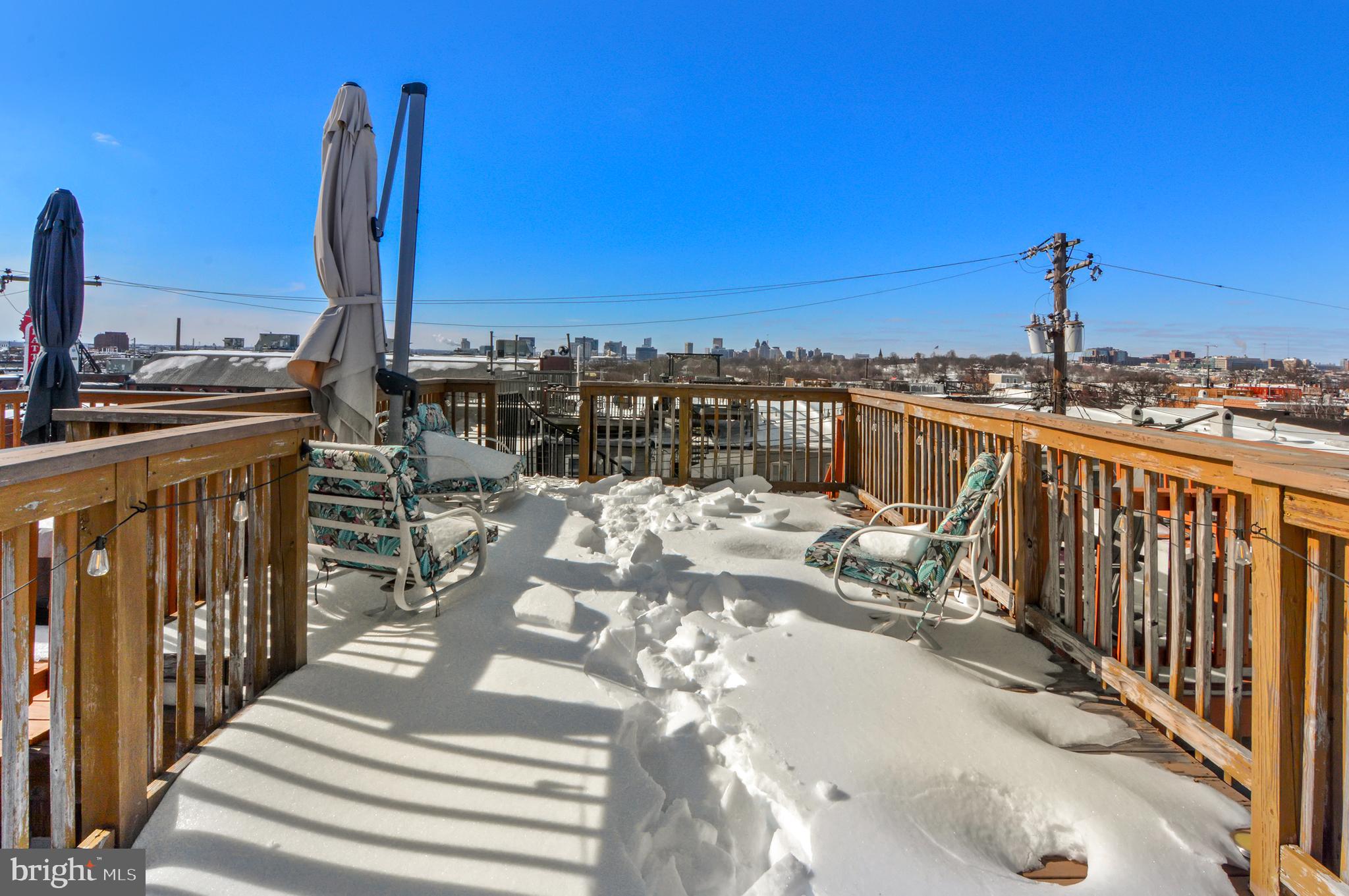 416 South Bouldin Street Baltimore, MD 21224 - Photo 37 of 45 a view of a balcony with city view