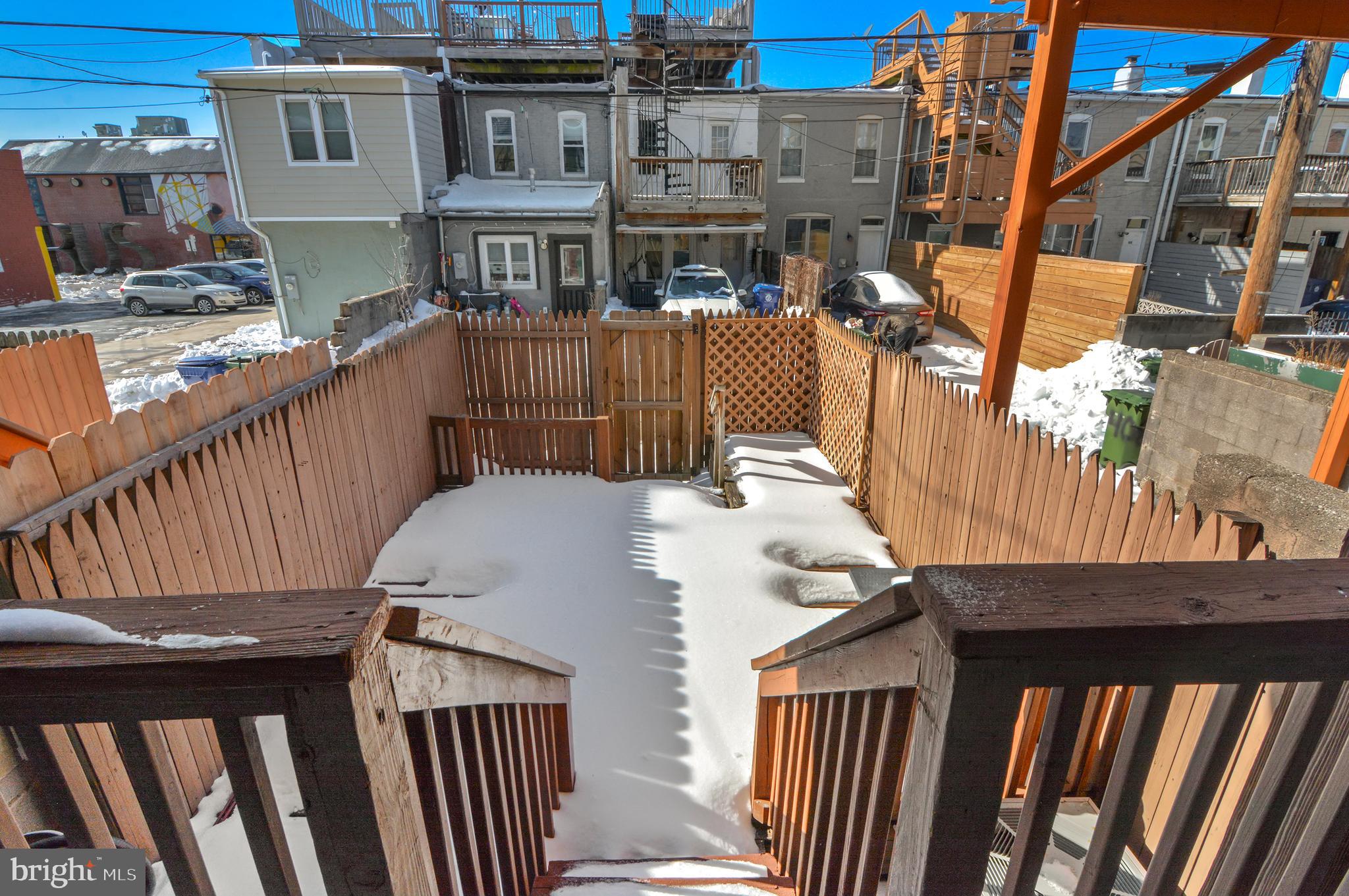 416 South Bouldin Street Baltimore, MD 21224 - Photo 44 of 45 a view of balcony with furniture and wooden deck