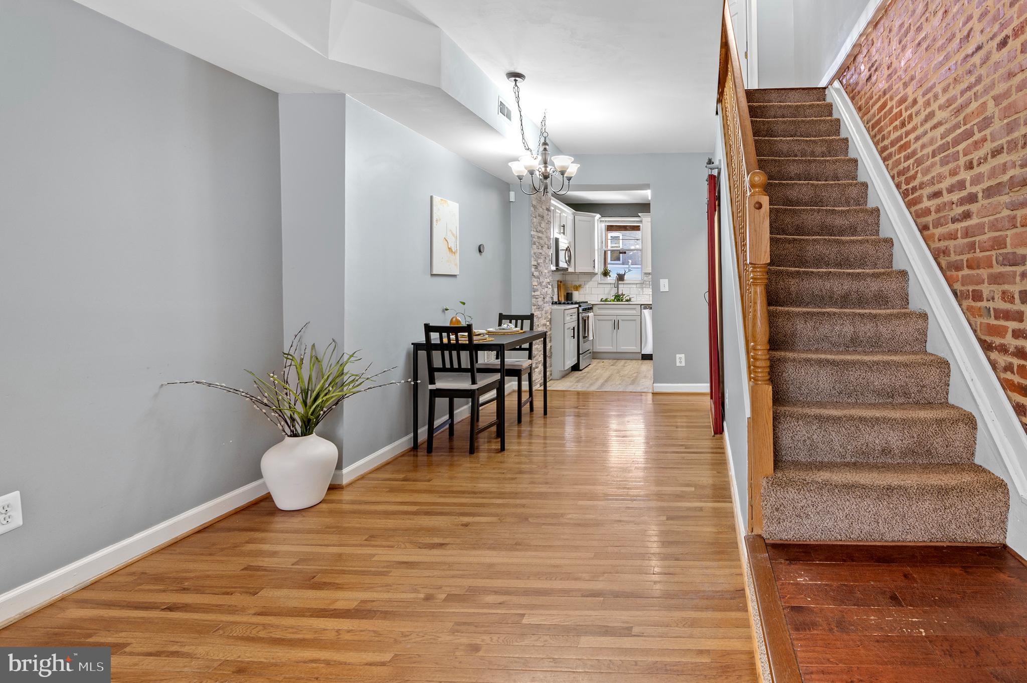 416 South Bouldin Street Baltimore, MD 21224 - Photo 8 of 45 a view of a livingroom with furniture and wooden floor