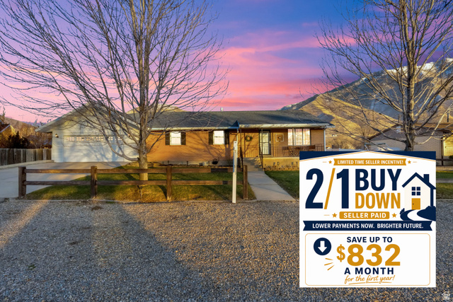 310 North 800 East Mapleton, UT 84664 - Photo 1 of 1 Single story home featuring a fenced front yard, driveway, and brick siding