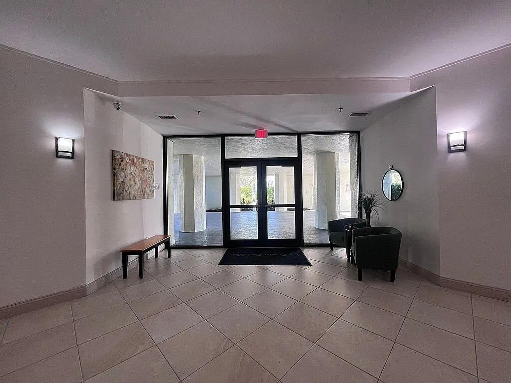 6463 La Costa Drive, Unit 105 Boca Raton, FL 33433 - Photo 38 of 40 a living room with furniture