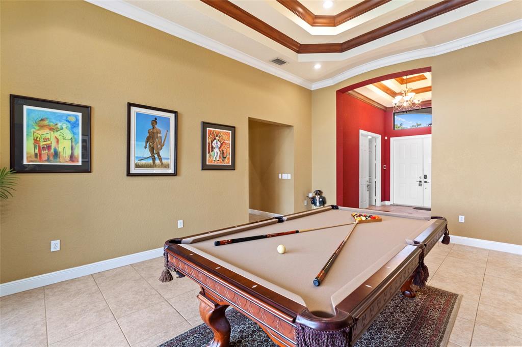 18622 Southwest 41st Street Miramar, FL 33029 - Photo 20 of 63 a room with pool table and two windows