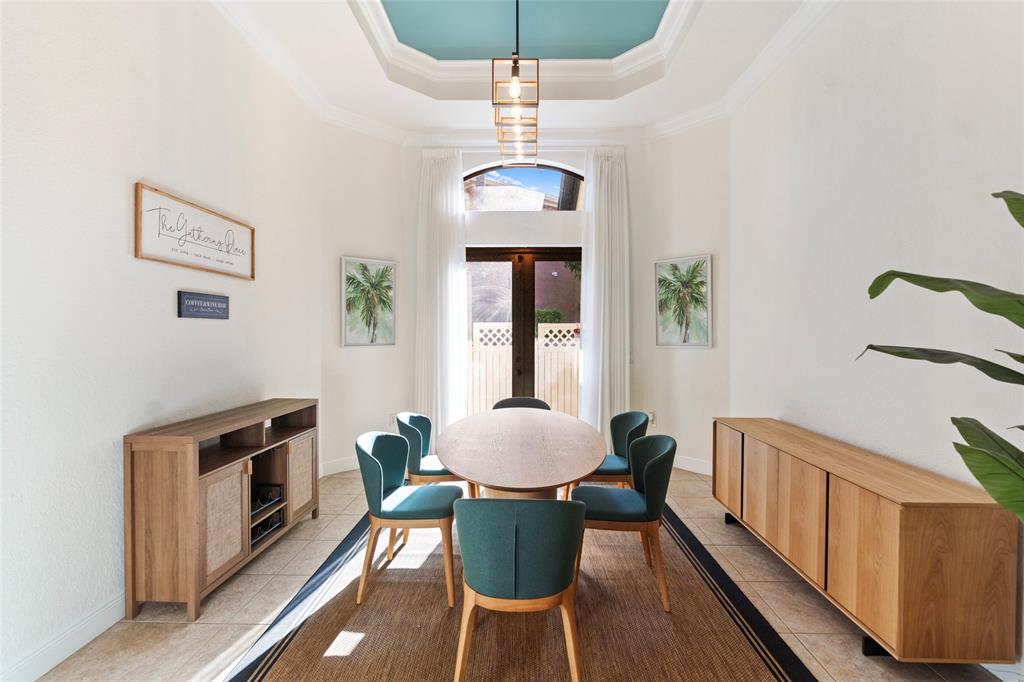 18622 Southwest 41st Street Miramar, FL 33029 - Photo 25 of 63 a dining room with furniture a chandelier and wooden floor