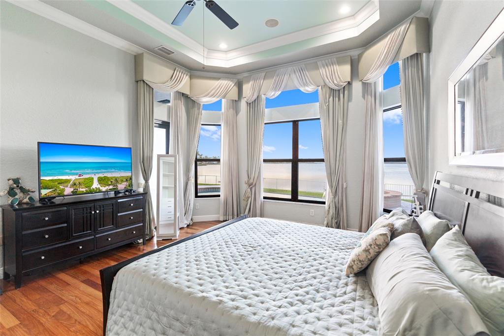 18622 Southwest 41st Street Miramar, FL 33029 - Photo 27 of 63 a bedroom with a bed and a flat screen tv