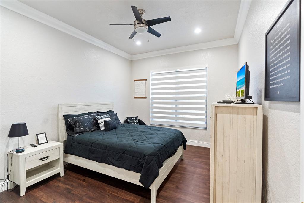 18622 Southwest 41st Street Miramar, FL 33029 - Photo 35 of 63 a bedroom with a bed and a ceiling fan