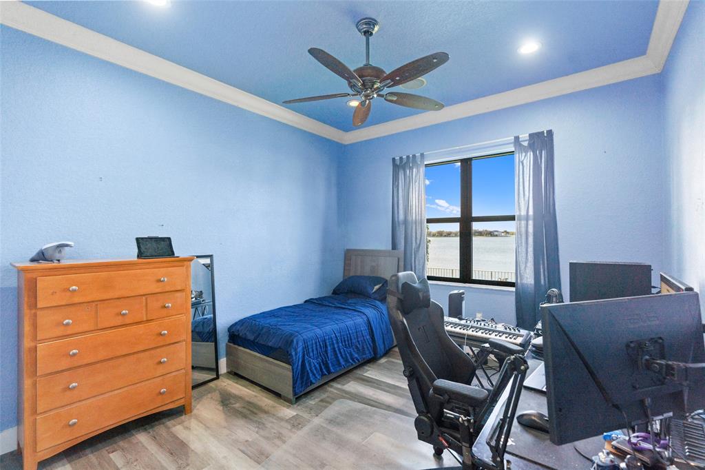 18622 Southwest 41st Street Miramar, FL 33029 - Photo 38 of 63 a bedroom with a bed and a window