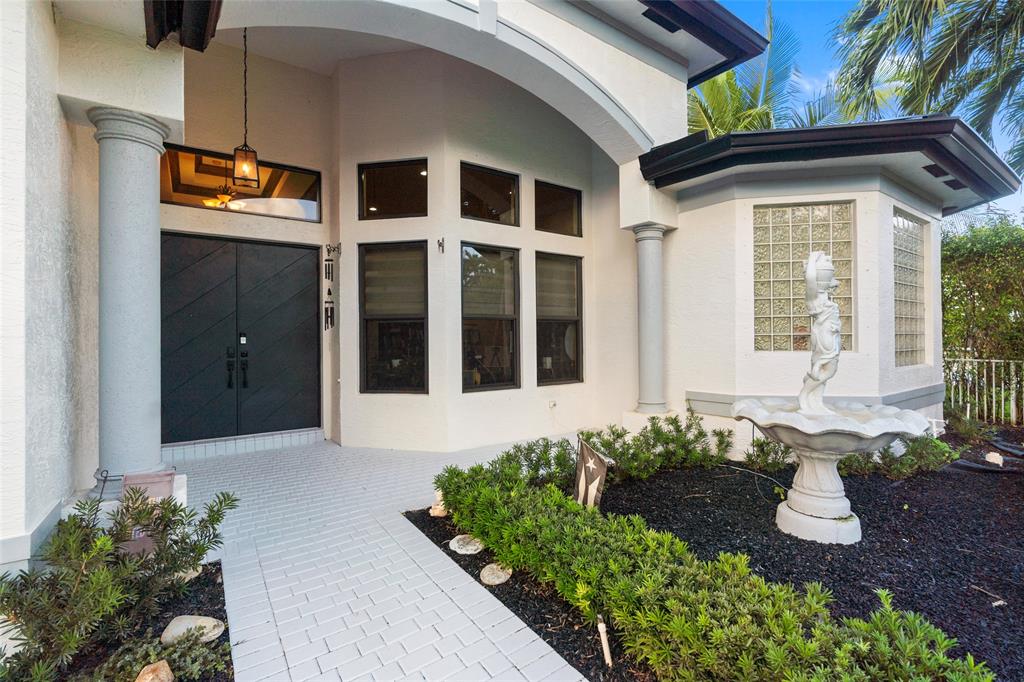 18622 Southwest 41st Street Miramar, FL 33029 - Photo 49 of 63 a front view of a house with a yard