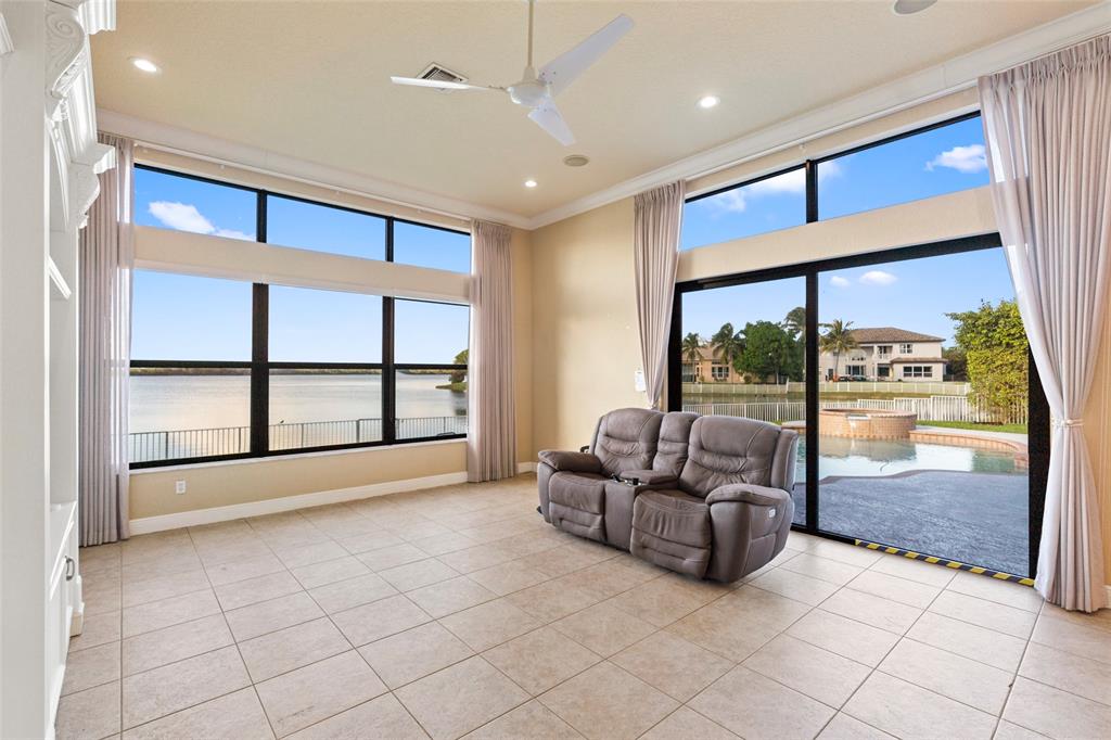 18622 Southwest 41st Street Miramar, FL 33029 - Photo 9 of 63 a living room with furniture and large windows